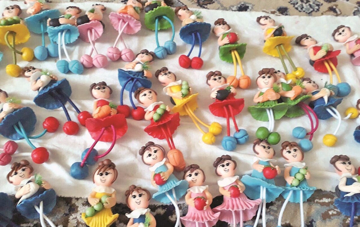 اشتغالزایی زهرا غزنوی با عروسکهای خمیری اشتغالزایی زهرا غزنوی با عروسکهای خمیری