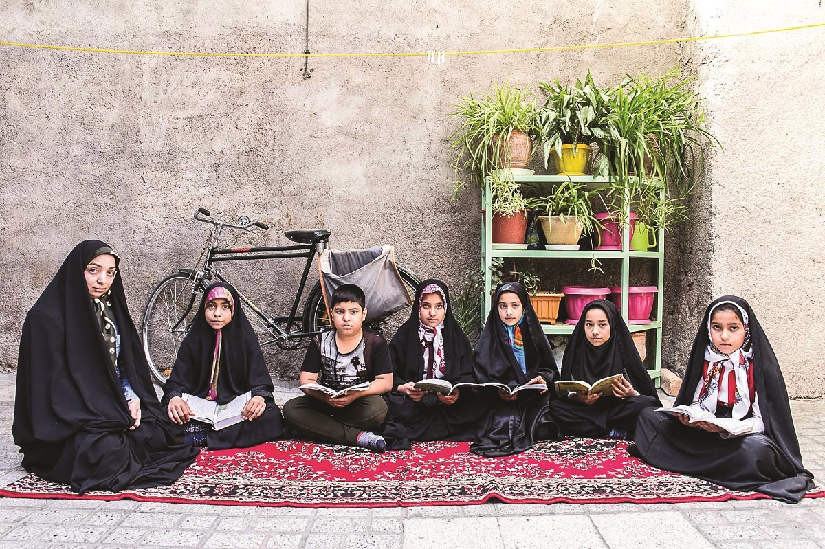 حکایت «ملازهرا» که اهالی محله پورسینا را با کتاب آسمانی آشنا کرد حکایت «ملازهرا» که اهالی محله پورسینا را با کتاب آسمانی آشنا کرد