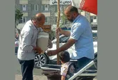 سقای پرچم&zwnj;داران تقاطع احمدآباد مشهد